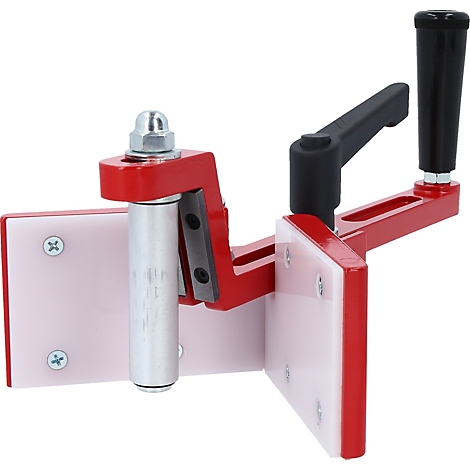 Rotes Werkzeug mit weißem Kunststoff, Schrauben und schwarzem Griff. Es dient zum präzisen Schneiden von Materialien.